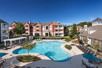 Two resort-style pools and sundeck with wi-fi